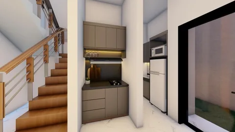 Area dapur rumah Bumi Citra Regency Serpong bersebelahan dengan tangga menuju lantai 2